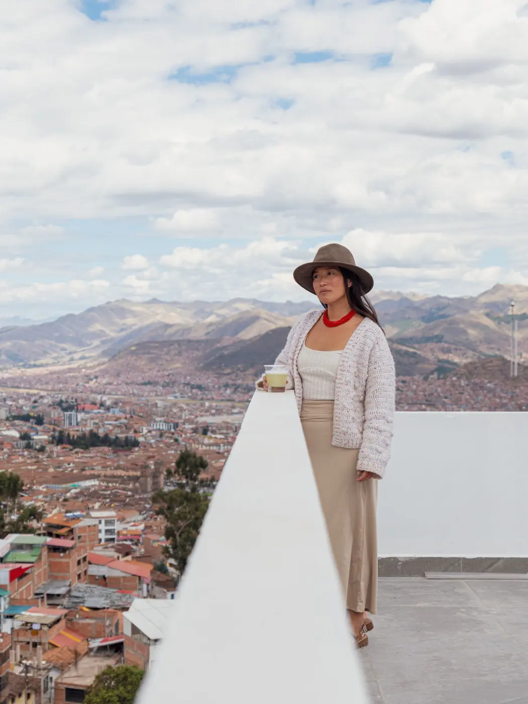 A traveller looking out at the Cusco landscape